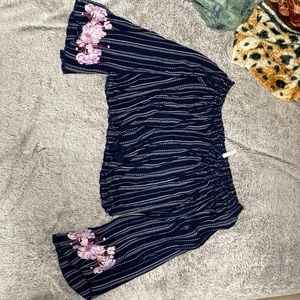 Woman’s off the shoulder crop top